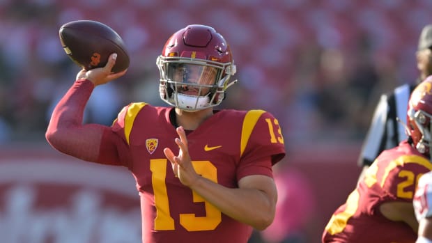 Caleb Williams throws the football.